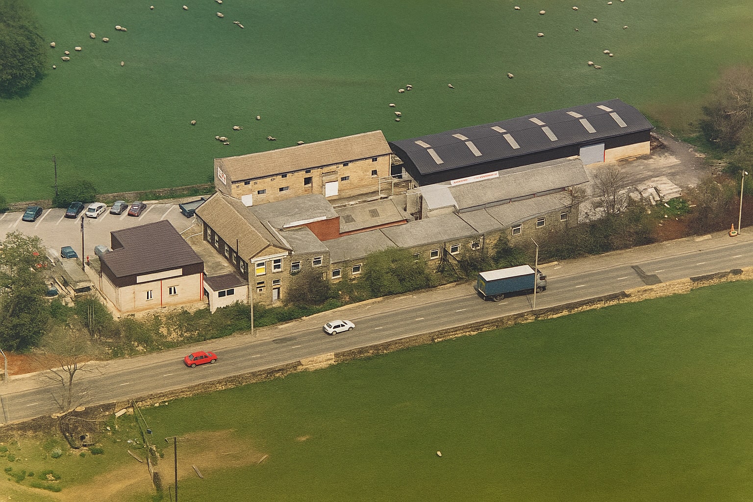 An old aerial view of Hoyle Mill Thurlstone showing it's history through the years.
