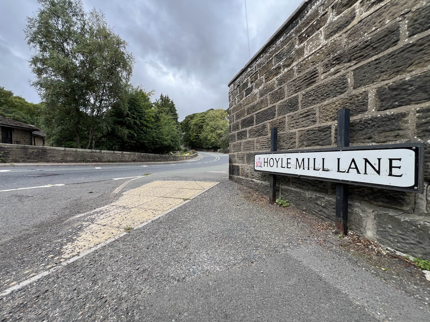An image of the Hoyle Mill Lane street sign.